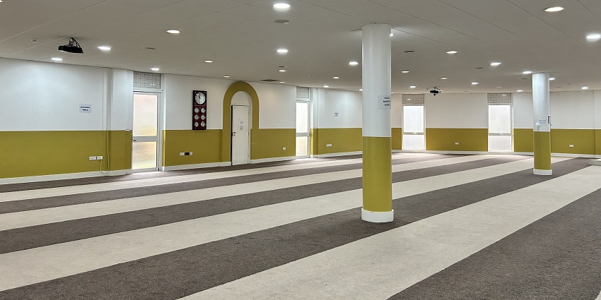A view of the well-maintained prayer hall at the mosque