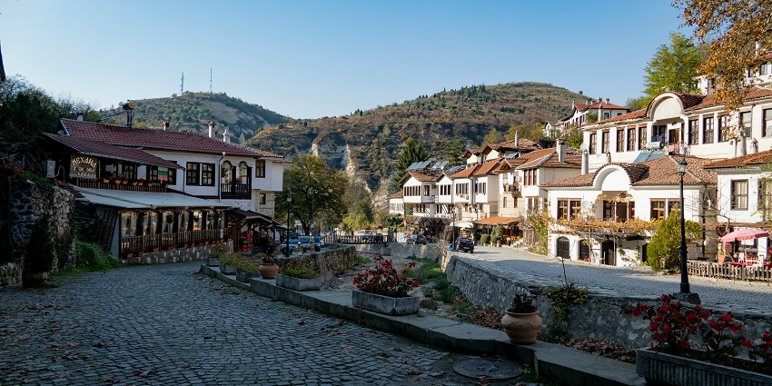 Image of a stone road with houses on either side of it - Places to visit in Bulgaria