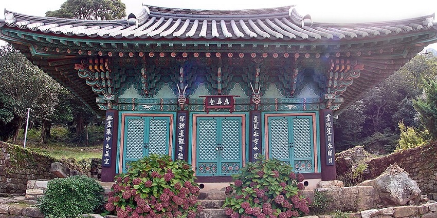 Scenic coastal temple offering serene landscapes and traditional Korean temple stay experiences.