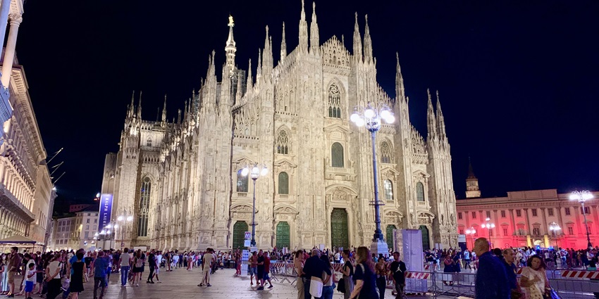 An image of Milan's Duomo and square, with the cathedral's intricate facade and spires.