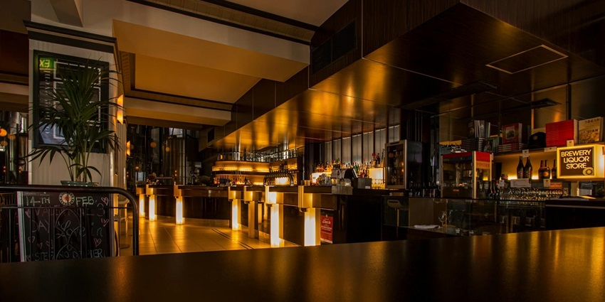 An image showing an empty bar filled with lights, similar to the vibrant Monkey Bar.