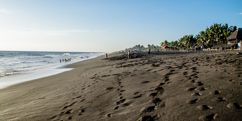 Unique volcanic beach with dark sands, nesting sea turtles, and powerful Pacific waves, the best place to celebrate Valentine’s Day in Guatemala