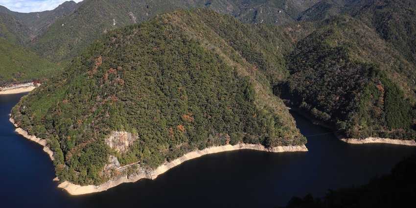 An image of the serene mountain peak of Mount Myojin offering stunning panoramic views.