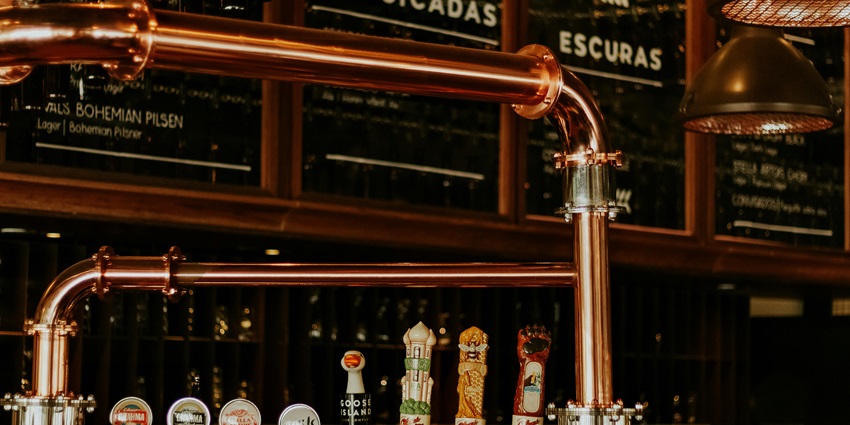 An image showing the drink dispensers highlighting the charm of the Munich Distillers