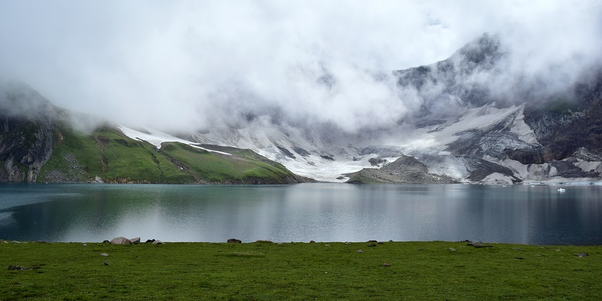 A beautiful image of a Lake with snow-covered mountains resembling the Munwarsar Lake
