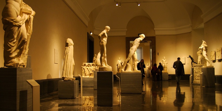 Portraits standing in the interior of Museo del Prado, a top museum in Madrid, Spain.
