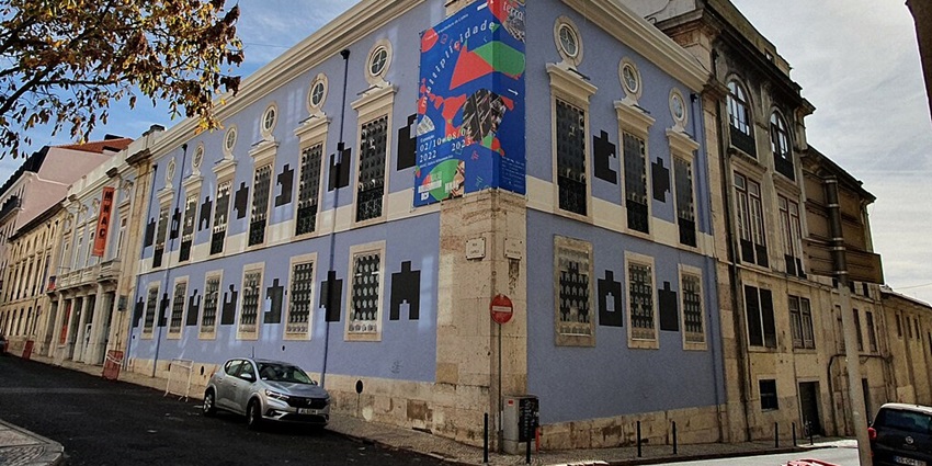 People analysing contemporary masterpieces showcased in the Modern Art Museum Lisbon