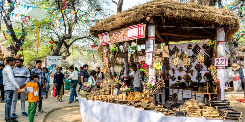 You can experience various activities and workshops at the Surajkund Mela 2025.
