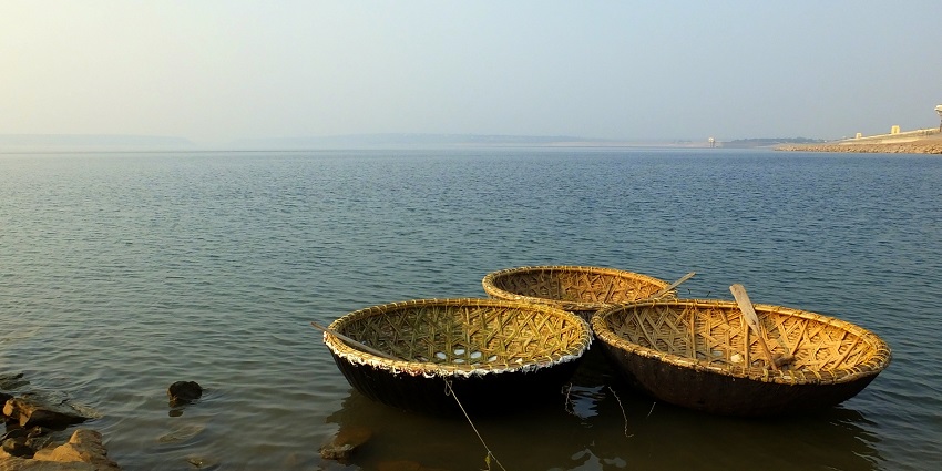 The view of Nagarjuna Sagar Lake with country boats in the clean water of the lake