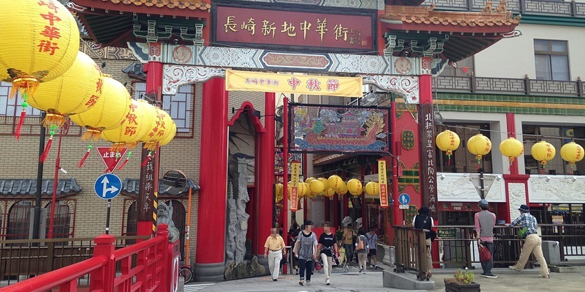 A striking red and gold Gembumon Gate marks the entrance to Chinatown in Nagasaki.