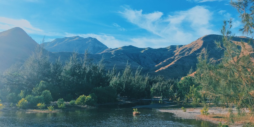 Nagsasa Cove with pristine beaches near Manila and crystal-clear blue waters.