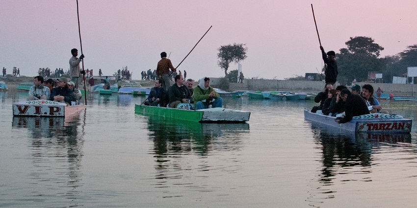 Nal Sarovar Lake in Gujarat with calm waters, birds, and a serene natural landscape.