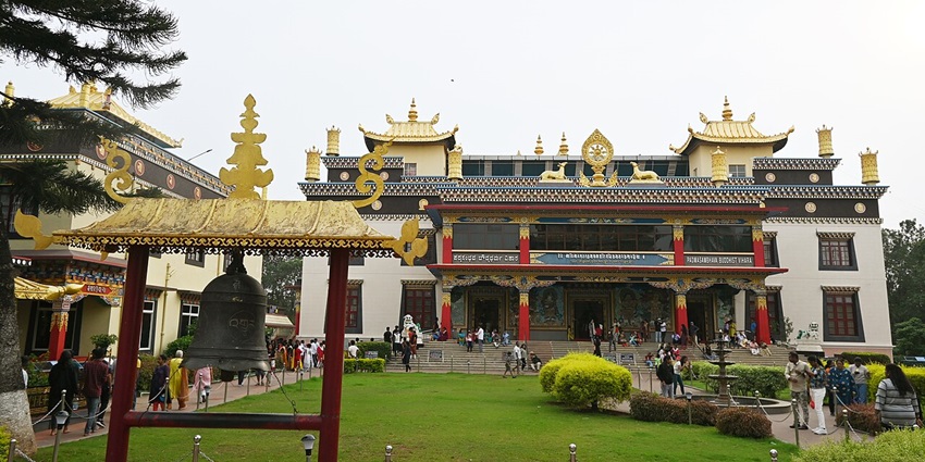 An image of Namdroling Monastery (Golden Temple) showcasing its golden structure and details.