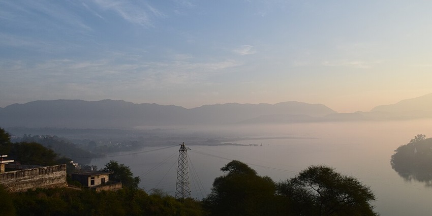 View of a misty Nangal Lake situated near Gurudwara Sri Bibhour Sahib in Punjab