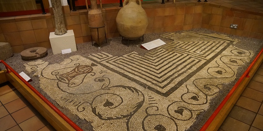 An image of Museo Nazionale Romano featuring a historic cloister surrounded by arches