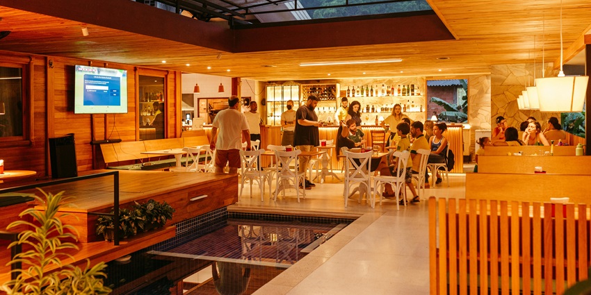 Busy people relaxing inside the Ned Kelly Restaurant & Irish Pub.