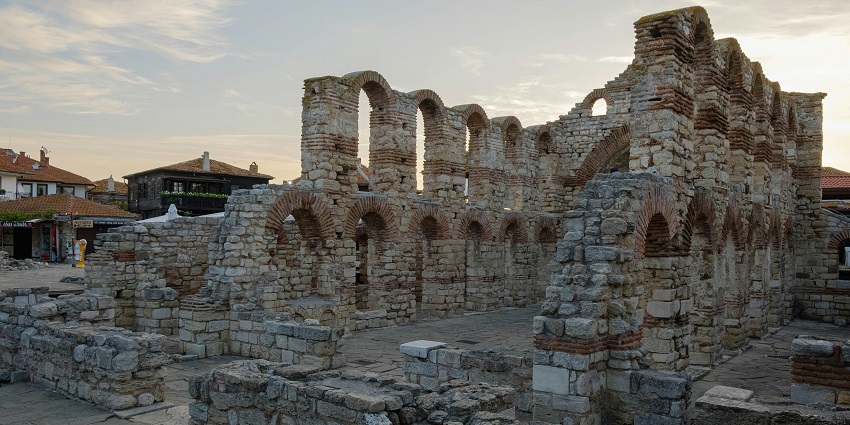 One of the best places to visit in Bulgaria - the ruins of a building with a sky in the background