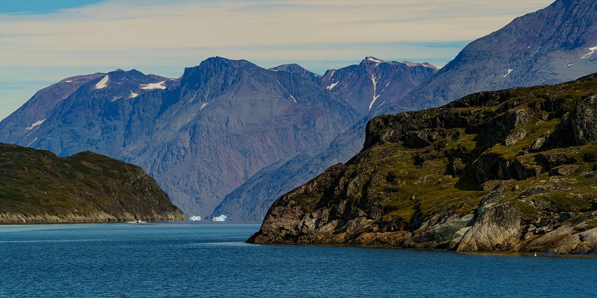 An Image of Nuuk, with rocky mountains in the background, a popular place to visit in Greenland