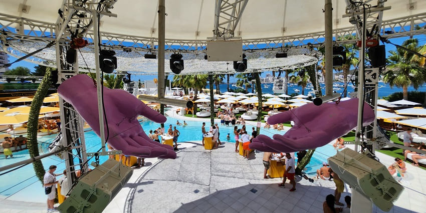 An image of guests enjoying poolside fun at O Beach Ibiza, a hotspot for Ibiza nightlife