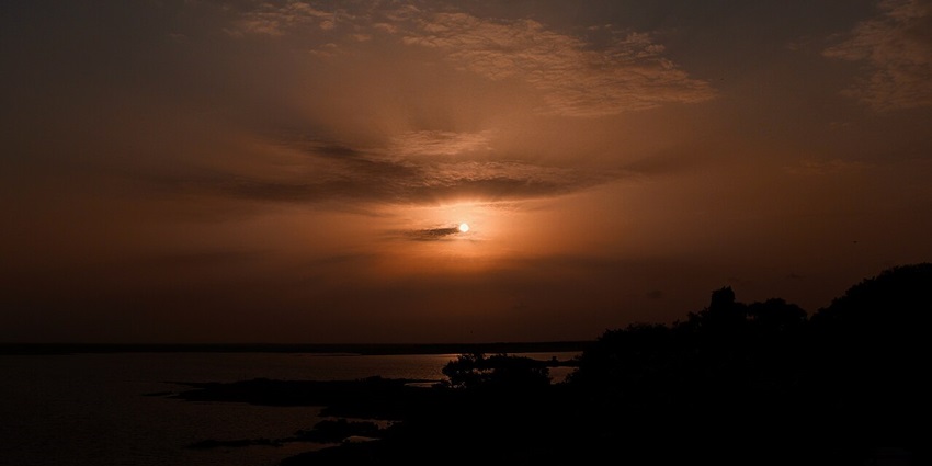 An image showing the sunset over Osman Sagar Lake, a Famous Place near GravityZip in Hyderabad.