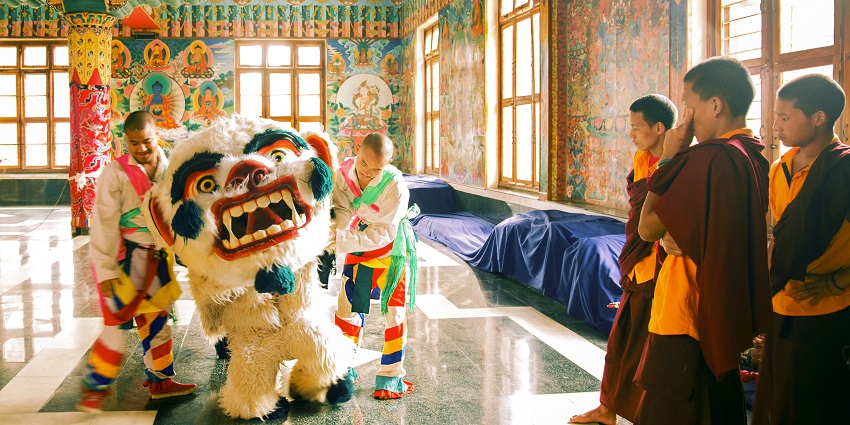 Image of monks getting ready for the Losar Festival in the Monastery