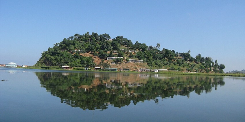 View of a lake in Guwahati with the mesmerising reflection of the townside.