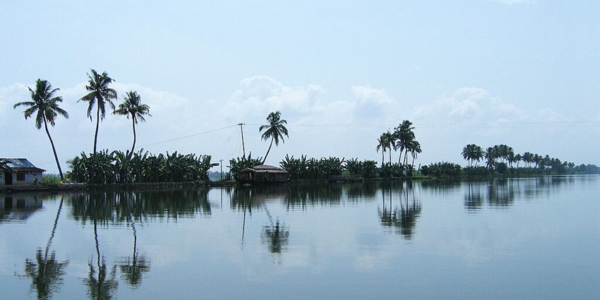 Scenes from Vembanad lake en route to Alappuzha Kottayam with coconut trees all around