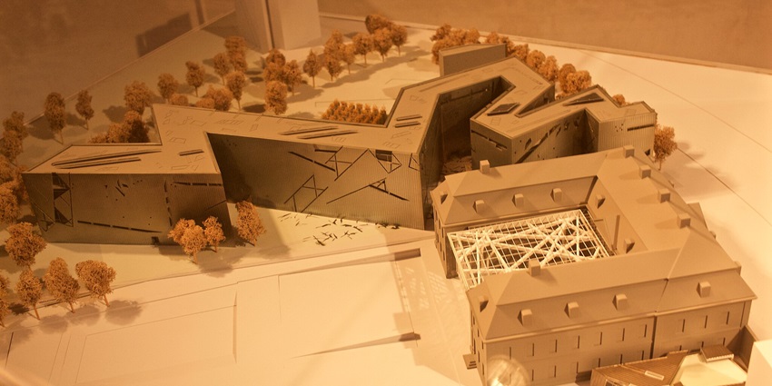 An image showing a detailed model of the Jewish Museum Berlin, showcasing its unique design.