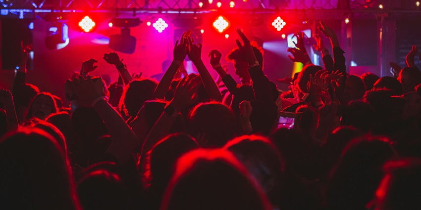 An image of people dancing in a night club capturing the essence of Munich nightlife
