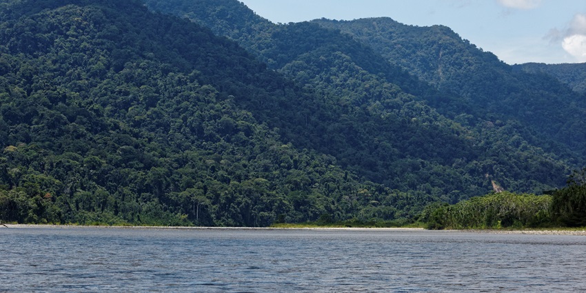 A biodiverse mountain range where the Andes meet the Amazon, featuring cloud forests, waterfalls, and exotic wildlife.