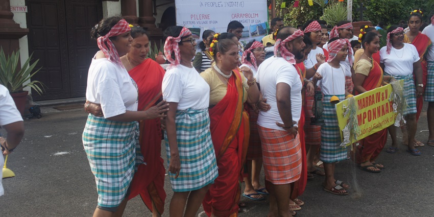 Image of Goa villagers posting for pictures during a festival - Shigmotsav Festival in Goa