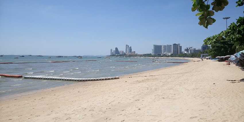 Captivating beachfront offering relaxation and water activities, showcased in the Pattaya city guide