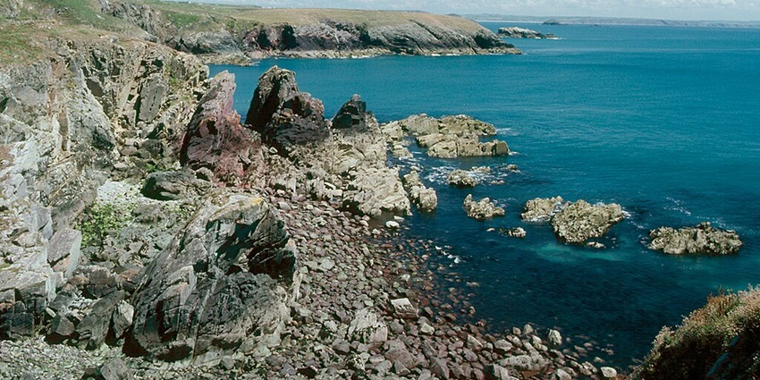 The Pembrokeshire Coast is among the places to visit in Wales with its cliffs and trails.