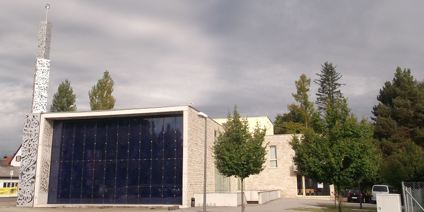 An image of Penzberg Mosque, highlighting its modern design and serene surroundings