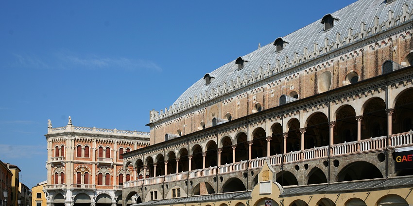 Lively square with market stalls and historic buildings in Verona, highlighted in Verona city guide