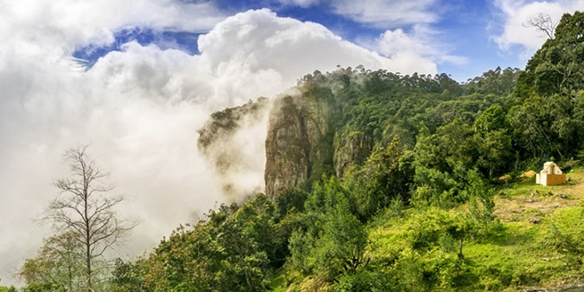 Majestic rock formations near Guna caves offer breathtaking views of the valley.