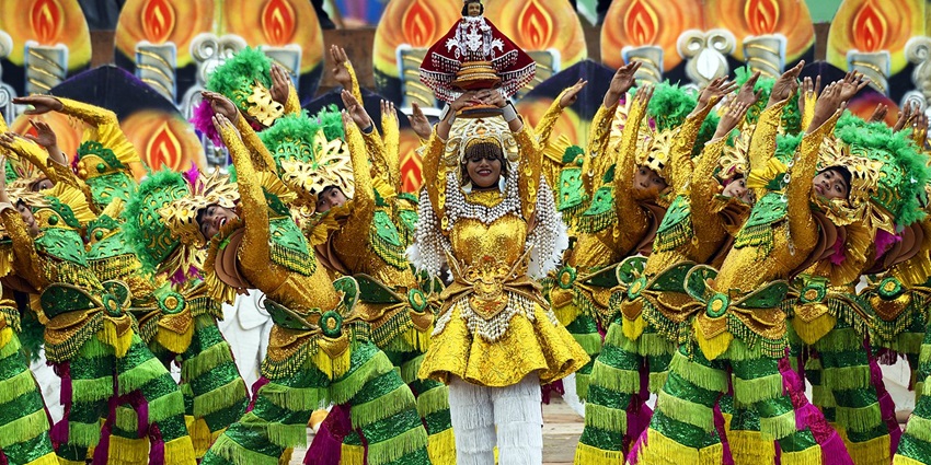 Pintados-Kasadyaan Festival with painted bodies, rhythmic drumbeats, and street dances.