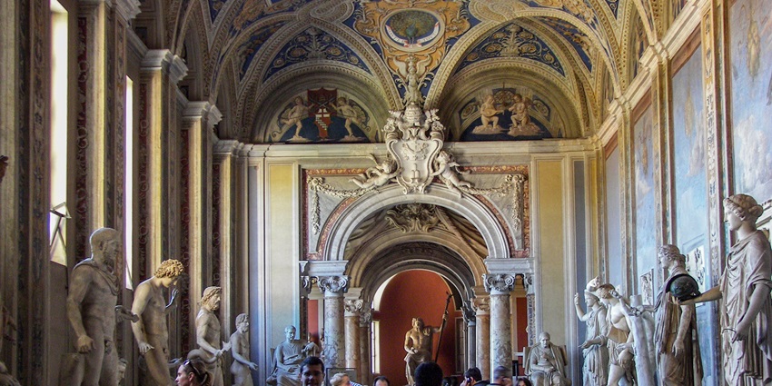 Vatican Museums showcasing ancient Roman and Greek sculptures.