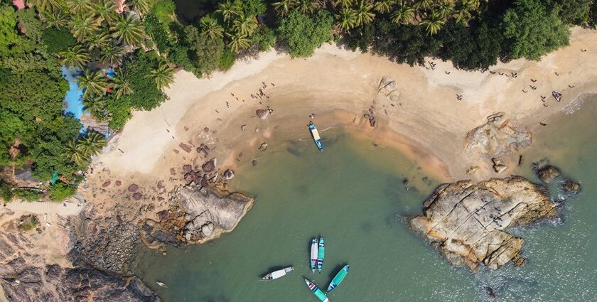 aerial view of people on beach during daytime - Places to visit in December in south India