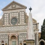 An exterior view of Santa Maria Novella, one of the best places to visit in Florence, Italy.