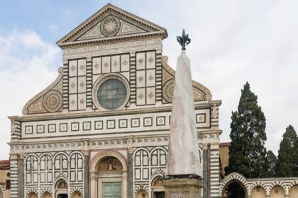 An exterior view of Santa Maria Novella, one of the best places to visit in Florence, Italy.