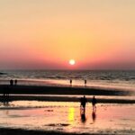 An image showing the calm beach in Mumbai, perfect for places to visit in India in May for couples.