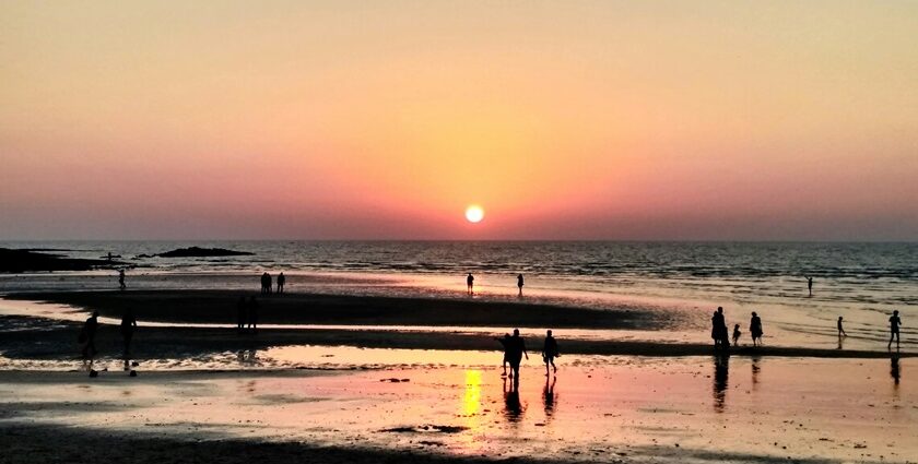 An image showing the calm beach in Mumbai, perfect for places to visit in India in May for couples.