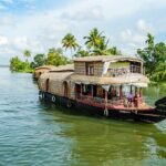 An image of scenic back water boats, one of the romantic places couples can visit in India.