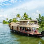 An image Houseboats floating over the Alleyppey/Alapphuzha Backwaters - places to go in September and October