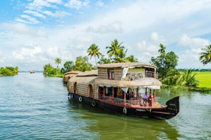 An image Houseboats floating over the Alleyppey/Alapphuzha Backwaters - places to go in September and October