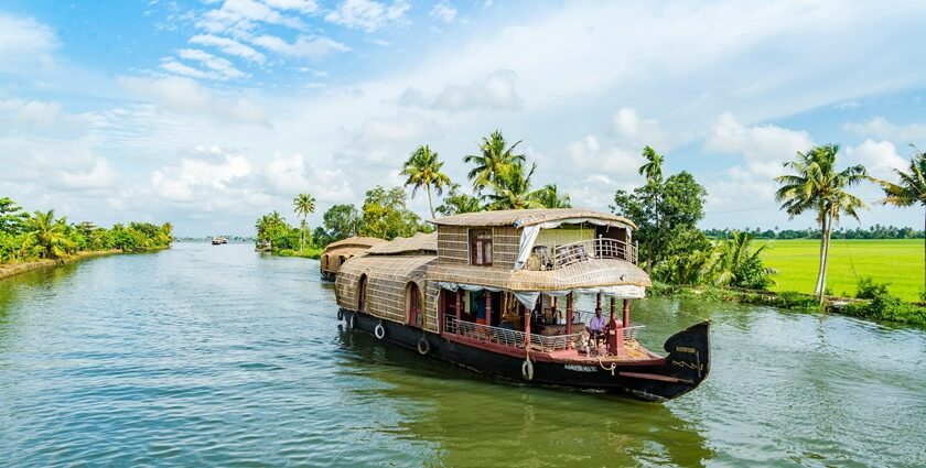 An image Houseboats floating over the Alleyppey/Alapphuzha Backwaters - places to go in September and October