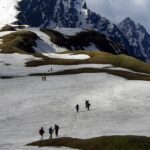 An Image of snowy hills, one of the best places to visit in November and December in India