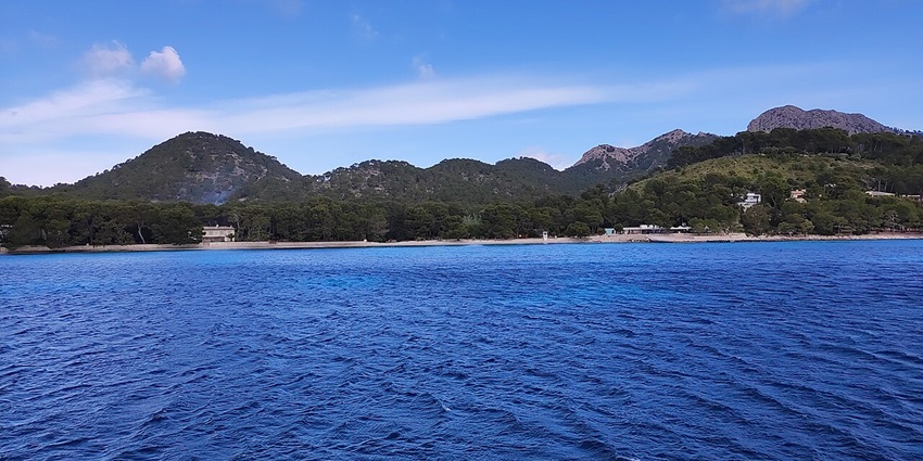 Image of stunning landscape at Playa de Formentor with clear blue water