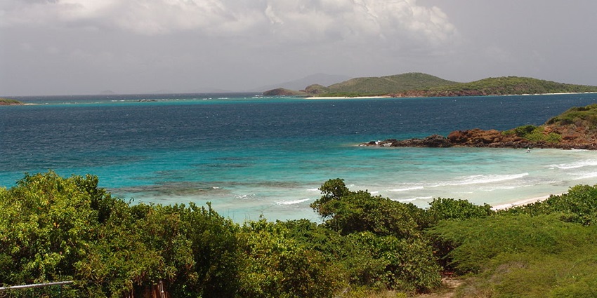 Scenic view of a tropical bay with turquoise water resembling Playa Resaca Beach